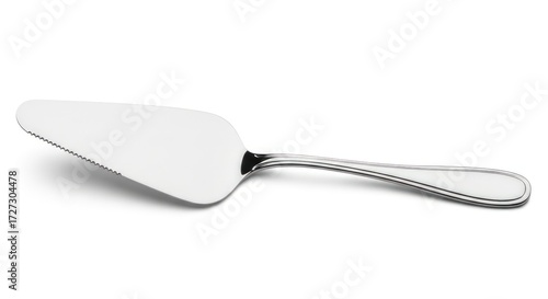 A polished stainless steel cake server with a decorative handle, isolated on a white background.