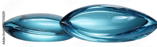 Two teardrop-shaped, translucent blue objects, possibly glass or resin, are shown against a white background.  They are smooth, glossy, and reflect light