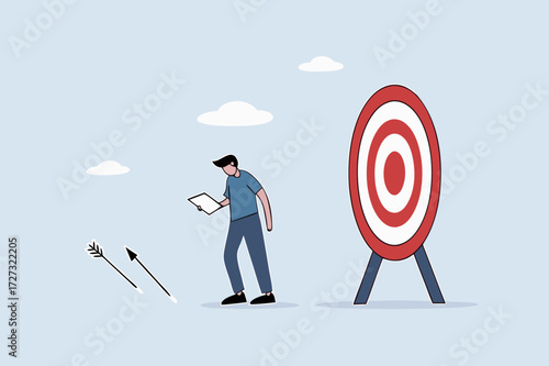 Learn from failure, entrepreneur with a book reflecting on missed goals, analyzing errors.

