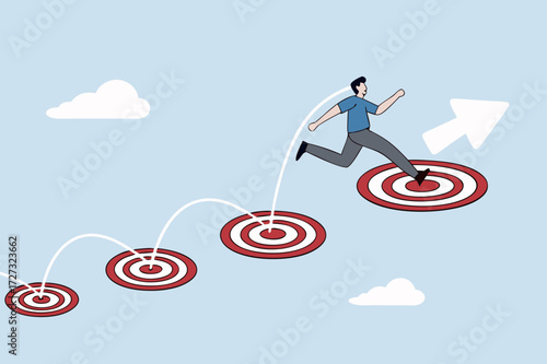 businessman jumping on bigger and higher archery bulls eye.