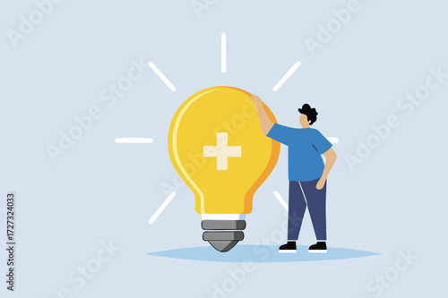 Positive thinking, businesswoman positioned with glowing light bulb concept featuring optimistic symbol.