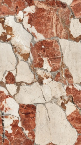 Close-up of a seamless natural stone tile pattern with vibrant red and white marble fragments,