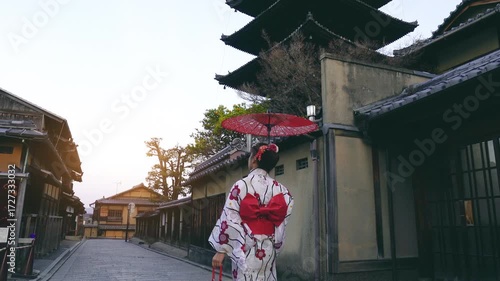 Asian woman wearing japanese traditional kimono at Yasaka Pagoda and Sannen Zaka Street in Kyoto, Japan.