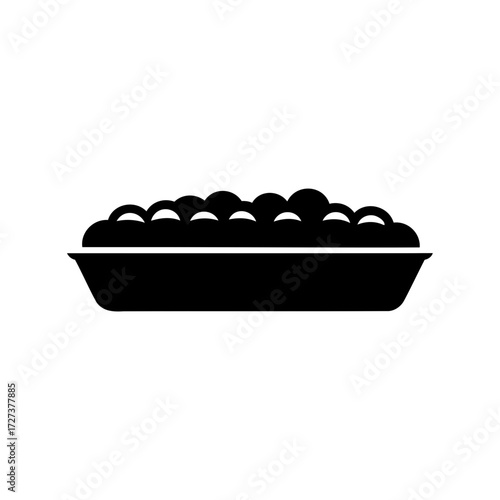 Bowl filled with rounded objects, food or other materials in abundance