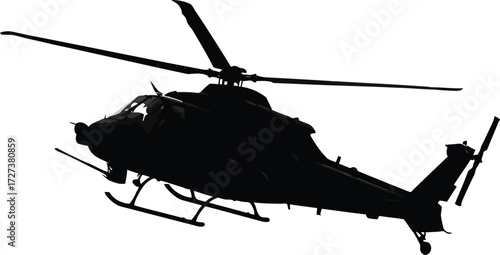 Silhouette of a military attack helicopter in flight vector