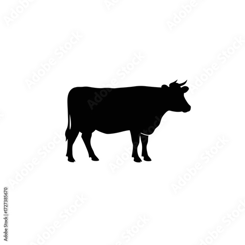 Silhouette of a cow standing in profile, a simple black and white image.