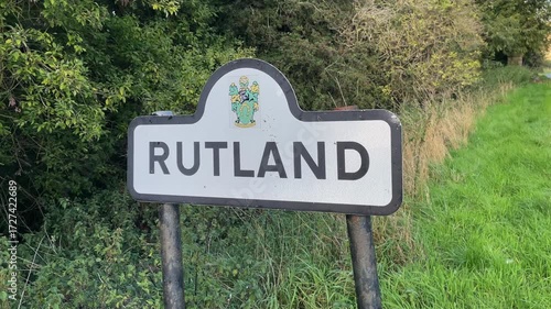 Pan to a Rutland county road sign at Stoke Dry England.