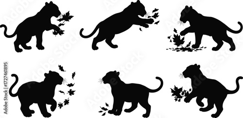 PrintBaby panther cub silhouettes playing with autumn leaves, wild jungle animal vector design, cute feline wildlife illustration, black panther art