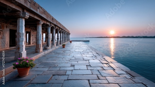 Ancient Stone Temple Architecture on Water with Sunrise Reflection and Flower Pots Under Clear Blue Sky in Cinematic HD