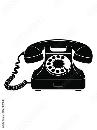 Classic black rotary dial telephone with coiled cord