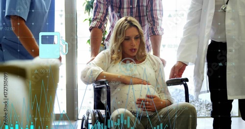 Pregnant woman laboring in clinic, care team pushing chair, floating icons  and  turquoise waveform