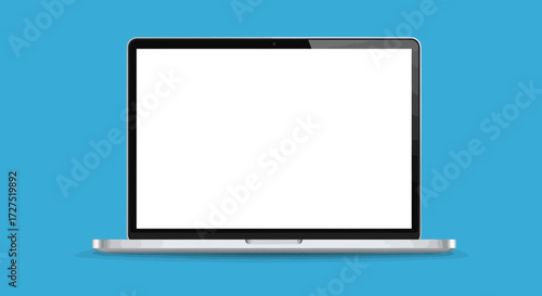A modern silver laptop with a blank white screen is open and displayed on a vibrant blue background, ready for content