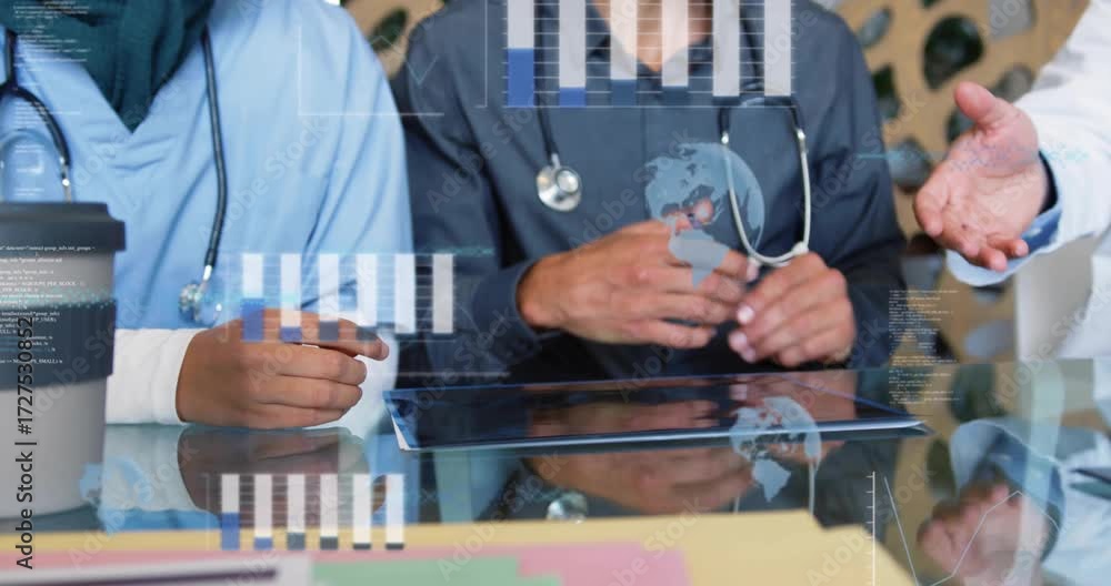medical team tapping tablet, reviewing bar chart and rotating globe ...