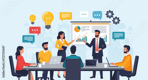 A diverse team of professionals actively participates in a business meeting, with one person presenting data and charts on a screen while others engage in discussion and work on laptops