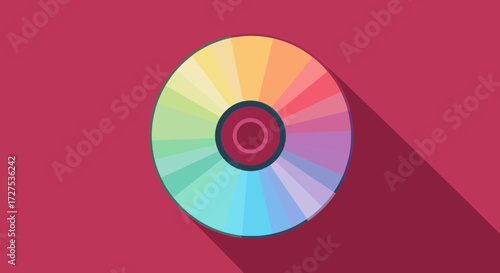 A vibrant color wheel with a spectrum of hues arranged in a circular pattern, casting a long shadow on a deep red background, representing design and creativity