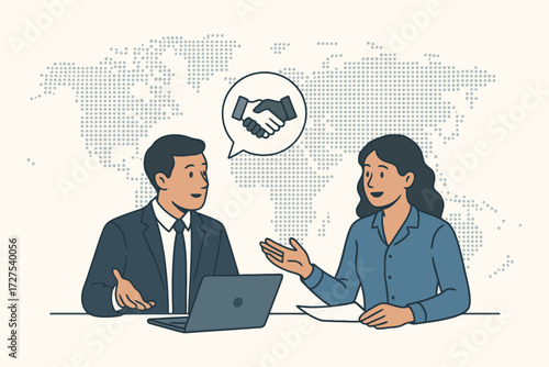 Business partners shaking hands over a laptop discussing global strategy with a world map background