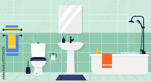 A modern and clean bathroom interior featuring a bathtub with running shower, a toilet, a sink with mirror, and towels, all set against a backdrop of green tiles
