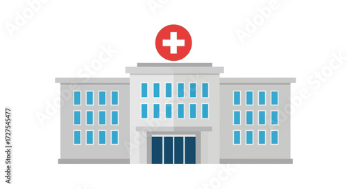 A modern hospital building with a prominent red cross symbol on top, featuring a symmetrical facade with numerous windows and a central entrance, representing healthcare and medical services