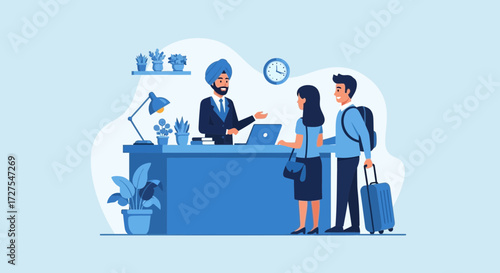 A couple with luggage checks in at a hotel reception desk with a friendly receptionist
