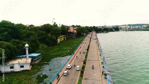 Upper Lake, VIP Road, Bhopal, Madhya Pradesh, India. Aerial drone shot of bhopal capital city of madhya pradesh with upper lake and downtown roads with car traffic in india