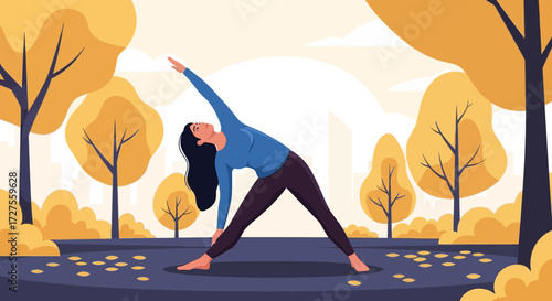 A woman practices yoga in a park during autumn, stretching her body in a graceful pose amidst trees with yellow foliage