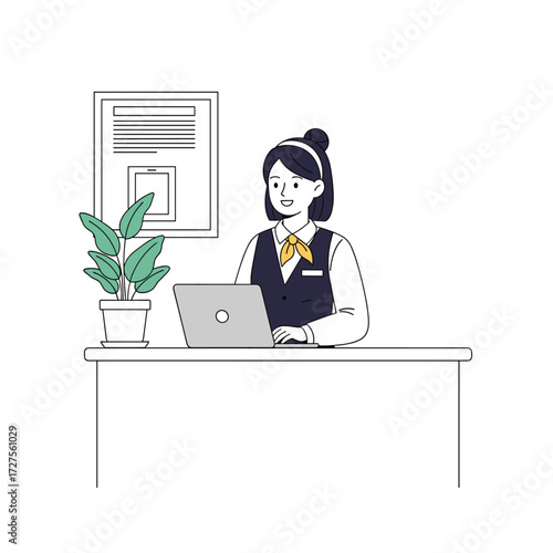 A professional woman working diligently on her laptop at her desk.