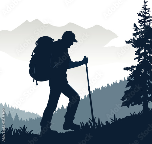 silhouette of a man walking in the mountains