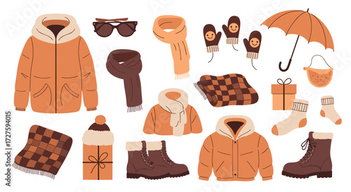 Collection of warm winter clothes and accessories for cold weather.