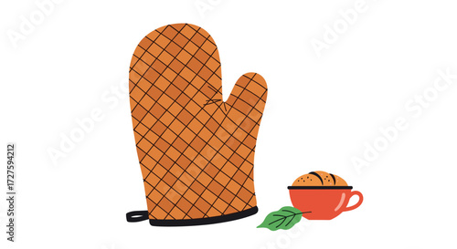 An orange oven mitt rests next to a small cup of food.