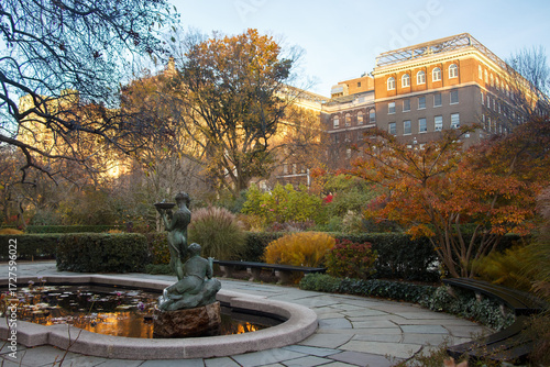Untermyer fountain (three dancing ladies) and the lush foliage and autumn leaves trees in Central Park, New York City, United States