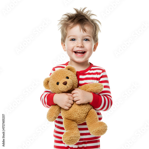 cheerful little boy in red and white striped pajamas holds teddy bear, isolated on white or transparent background. PNG