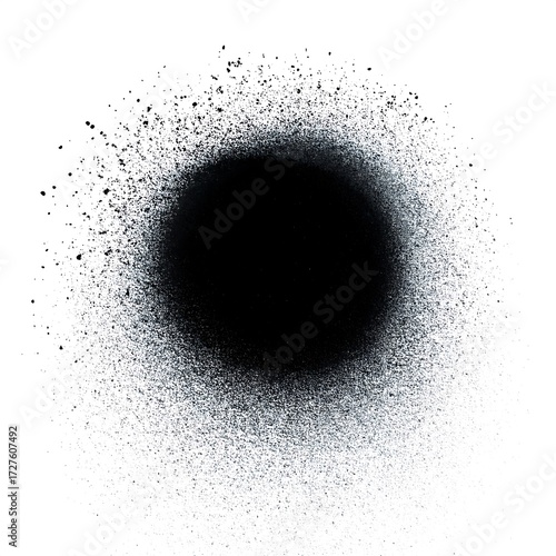 Abstract black spray paint splatter effect isolated on a white background, creating a dynamic and textured graphic element