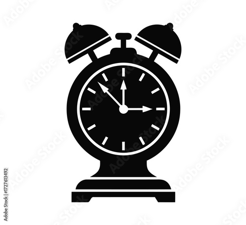 Alarm clock with bells showing the time passing