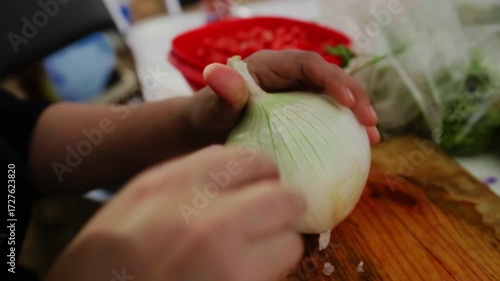 Salsa Preparation: Peeling and Slicing a White Onion in a Home Kitchen