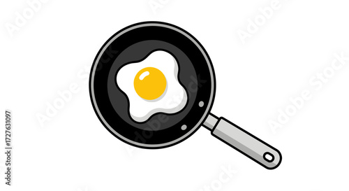 A single fried egg cooking in a black non-stick frying pan with a silver handle.