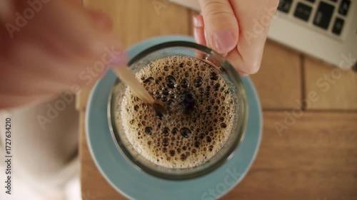 pouring coffee into cup