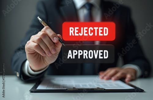 Businessman holds pen over document making choice between rejected and approved. Decision concept for loan application or business contract.