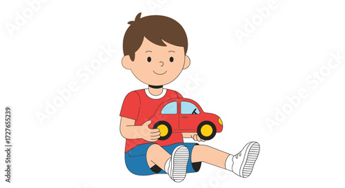 Young boy happily holding a red toy car sitting down.