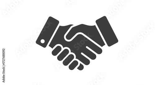 Two hands shaking in a gesture of agreement and partnership.