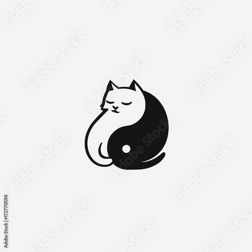A black and white cat with a yin yang symbol
