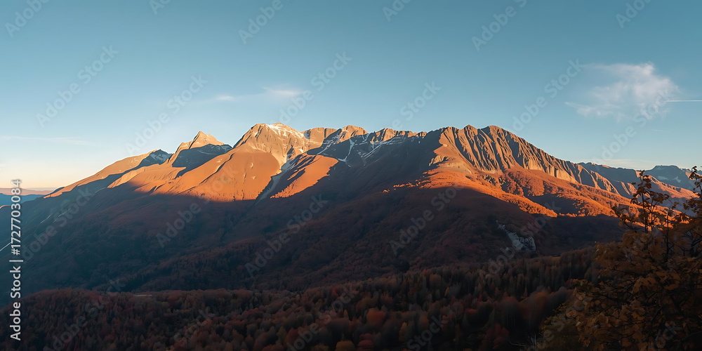 Fototapeta premium Majestic Peaks Under Blue Sky