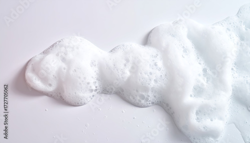 Close-Up of White Cleanser Foam – Soap and Shampoo Bubbles for Skin Care	
