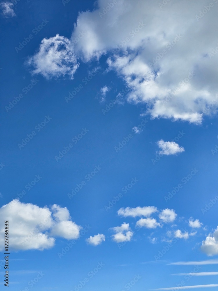 Fototapeta premium Cloudscape in Clear Blue Sky
