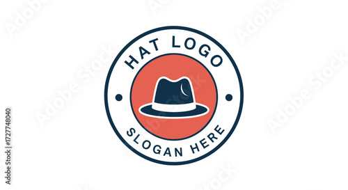 A circular logo design featuring a stylized fedora hat in the center, with the text "HAT LOGO" and "SLOGAN HERE" encircling it.