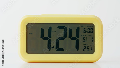 Obraz na płótnie Closeup electric clock display showing time and date