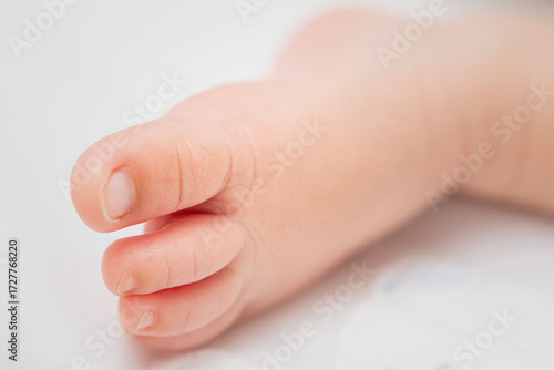 the left foot of a newborn baby
