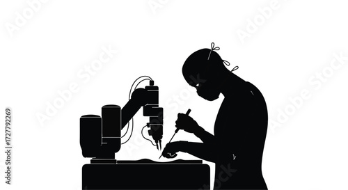 Silhouette of a person working with a robotic arm, symbolizing future technology and precision manufacturing.
