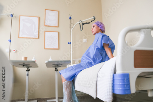 moscow, russia, 19.02.2025 A woman in a hospital bed with a purple hat on
