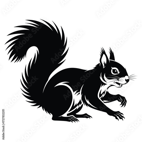 Silhouette of a black squirrel with bushy tail in profile