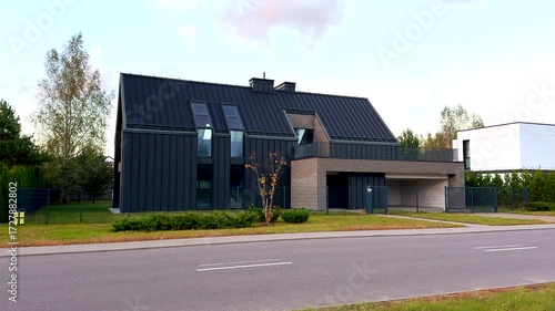 Wallpaper Mural Euro fence, Gated driveway of Modern Scandinavian Barnhouse. Modern luxury house with black metal roof. Premium Suburban Scandi home. Prefabricated Concrete Panel House. Barn Style Contemporary home. Torontodigital.ca